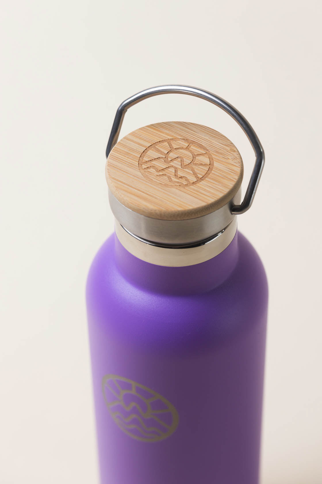McClumsy 24oz Stainless Steel Purple Water Bottle Top View With McClumsy Logo