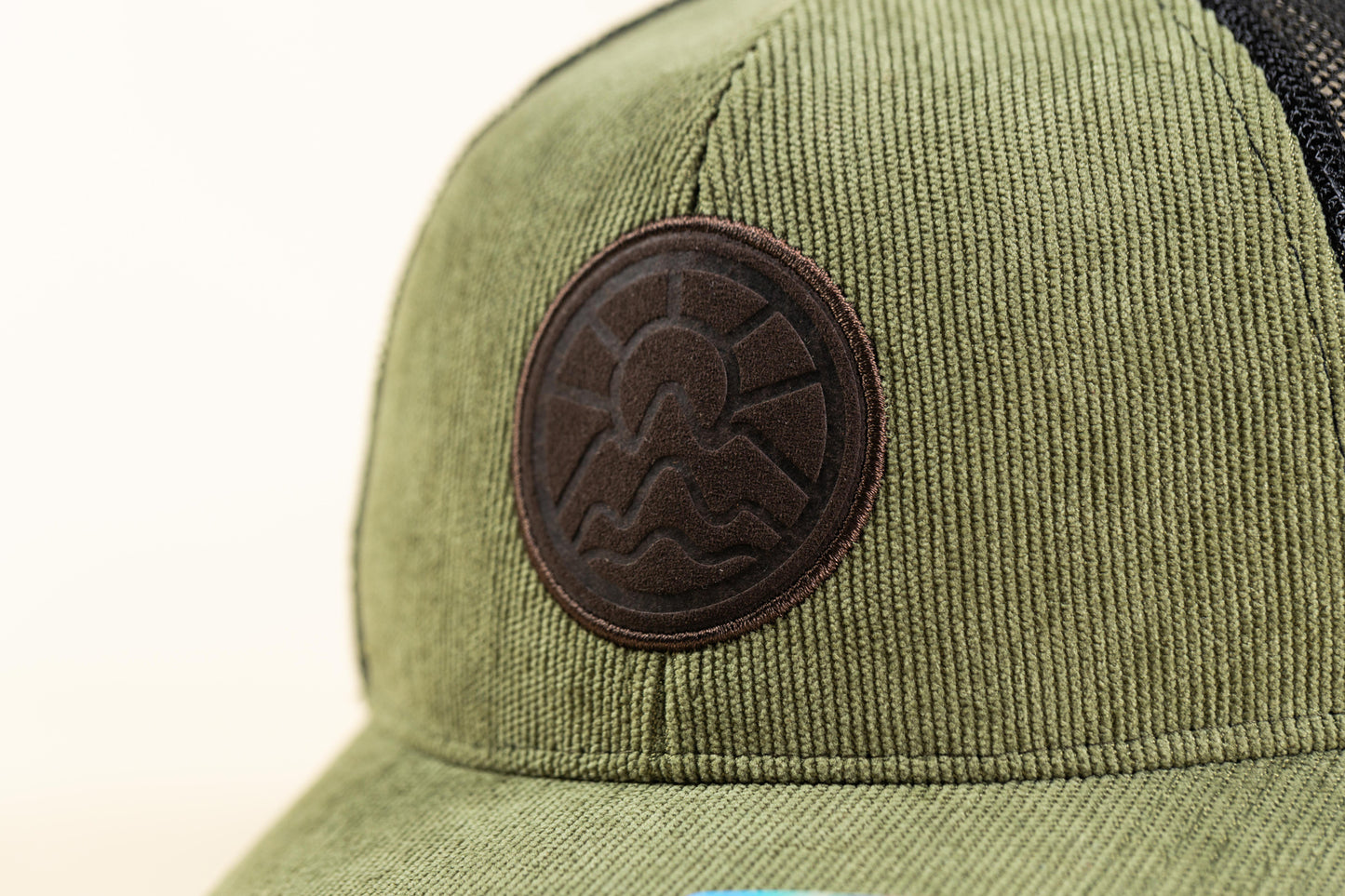 McClumsy 6 Panel Suede Patch Olive Chord Front Logo Close