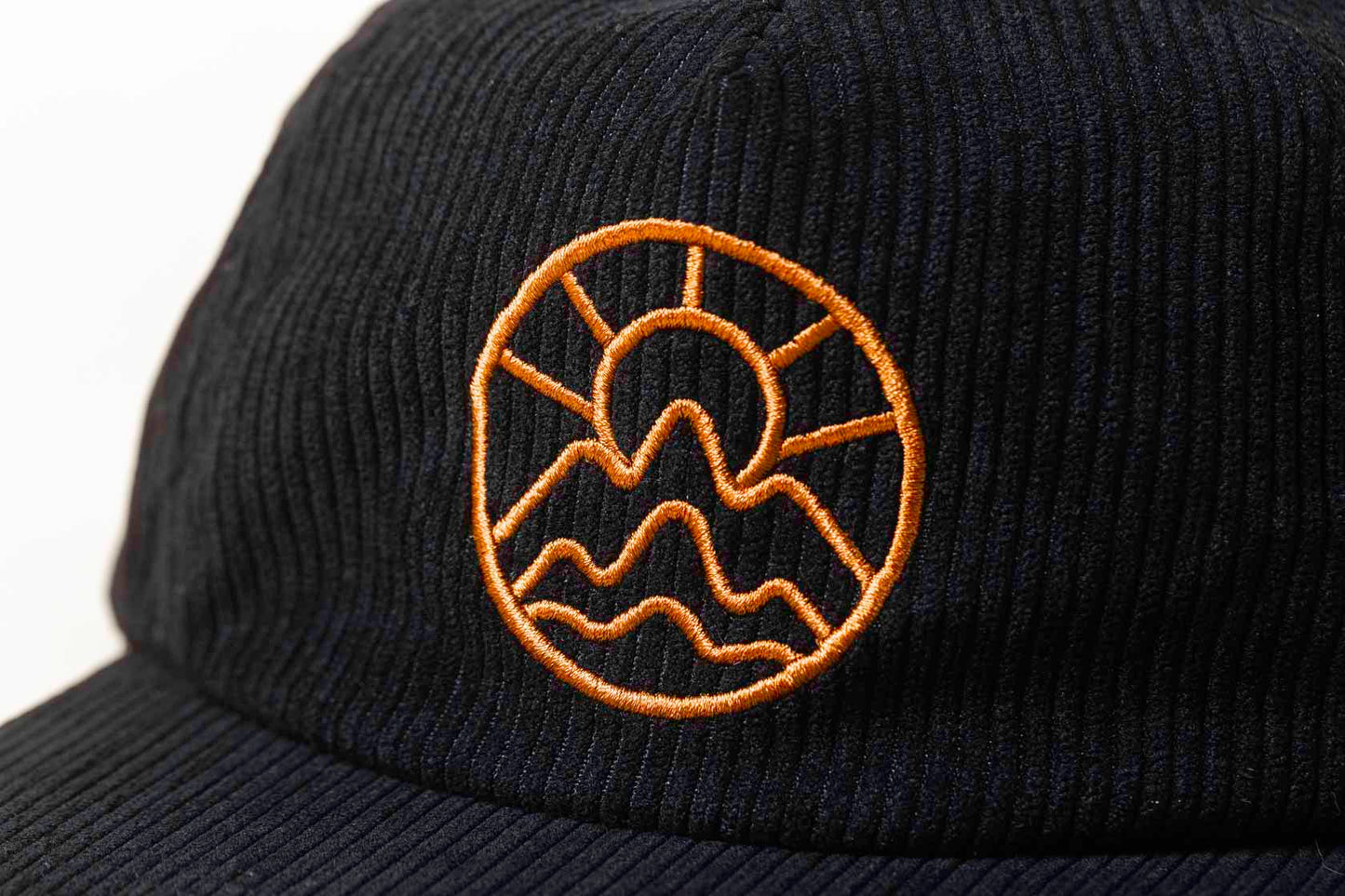 McClumsy Black 5 Panel Corduroy Logo Close up
