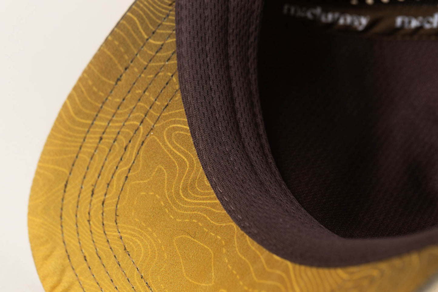 McClumsy Brook Trout Foam Trucker Hat Close Up of Under Bill and Sweat Band