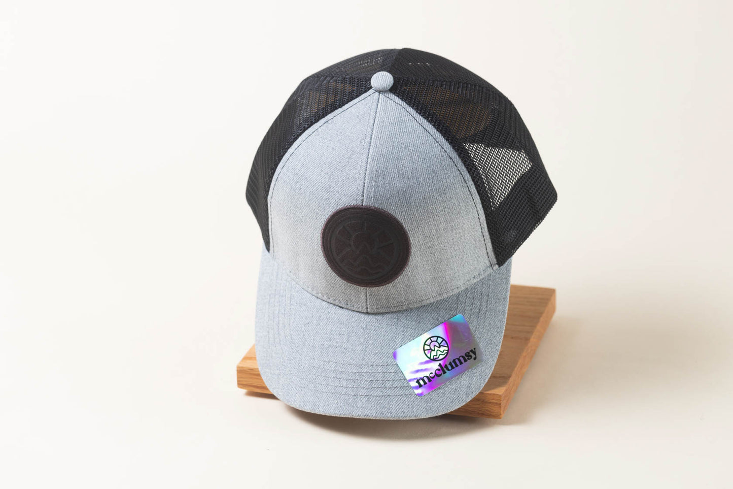 McClumsy Hat Brown Suede logo on gray black Front