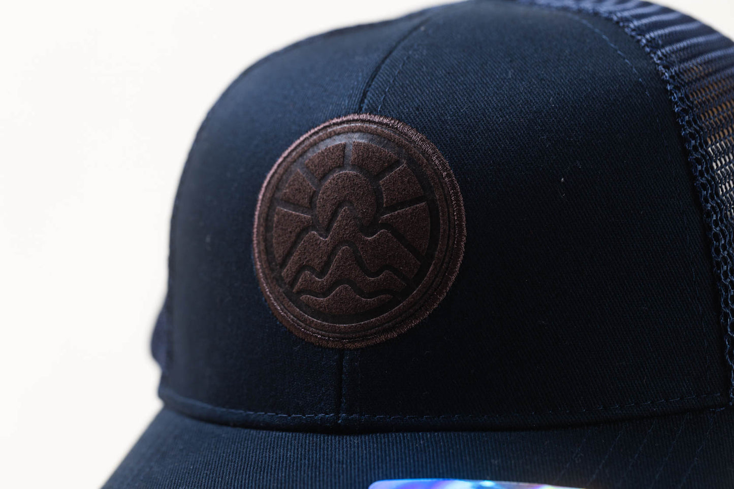 McClumsy McLogo Hat Brown Suede Leather on Blue Logo Close