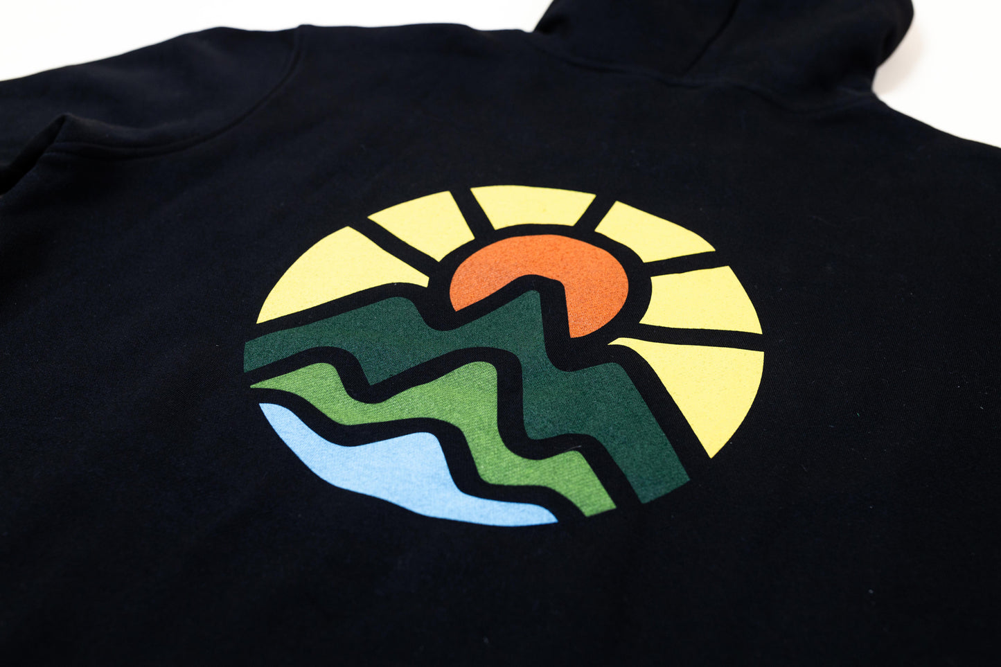 McClumsy Pullover Hoodie Black Full Color Logo Back Close