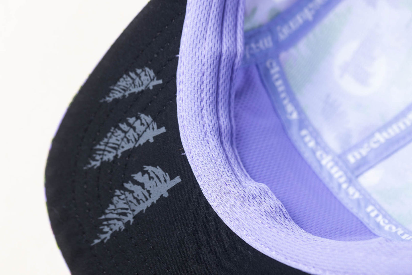 McClumsy Roaring Plains Crushable Camper Hat Purple Under Bill with Flag Spruce and Sweat Band