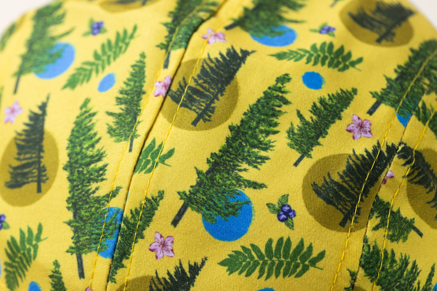 McClumsy Roaring Plains Crushable Camper Hat Yellow Repeater Pattern Close up