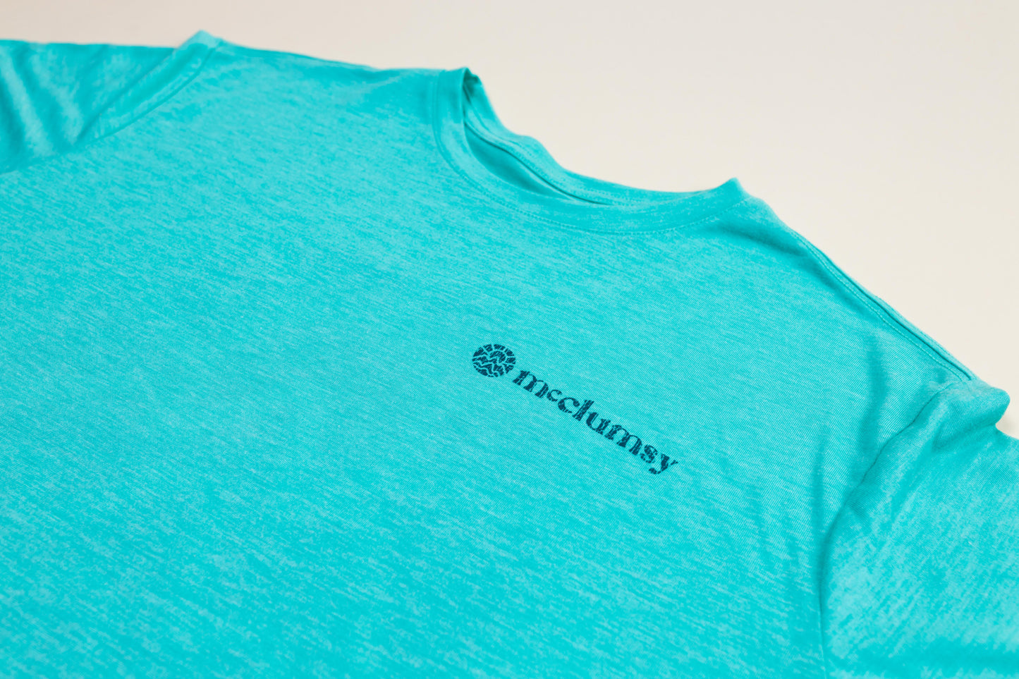 McClumsy Tee Caribbean Blue Triblend Front Close Up