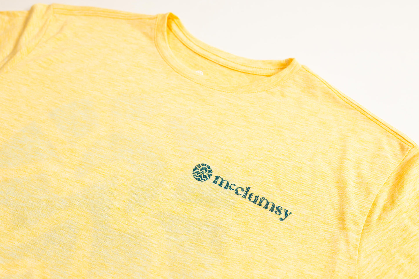 McClumsy Tee Yellow Triblend Front Close Logo