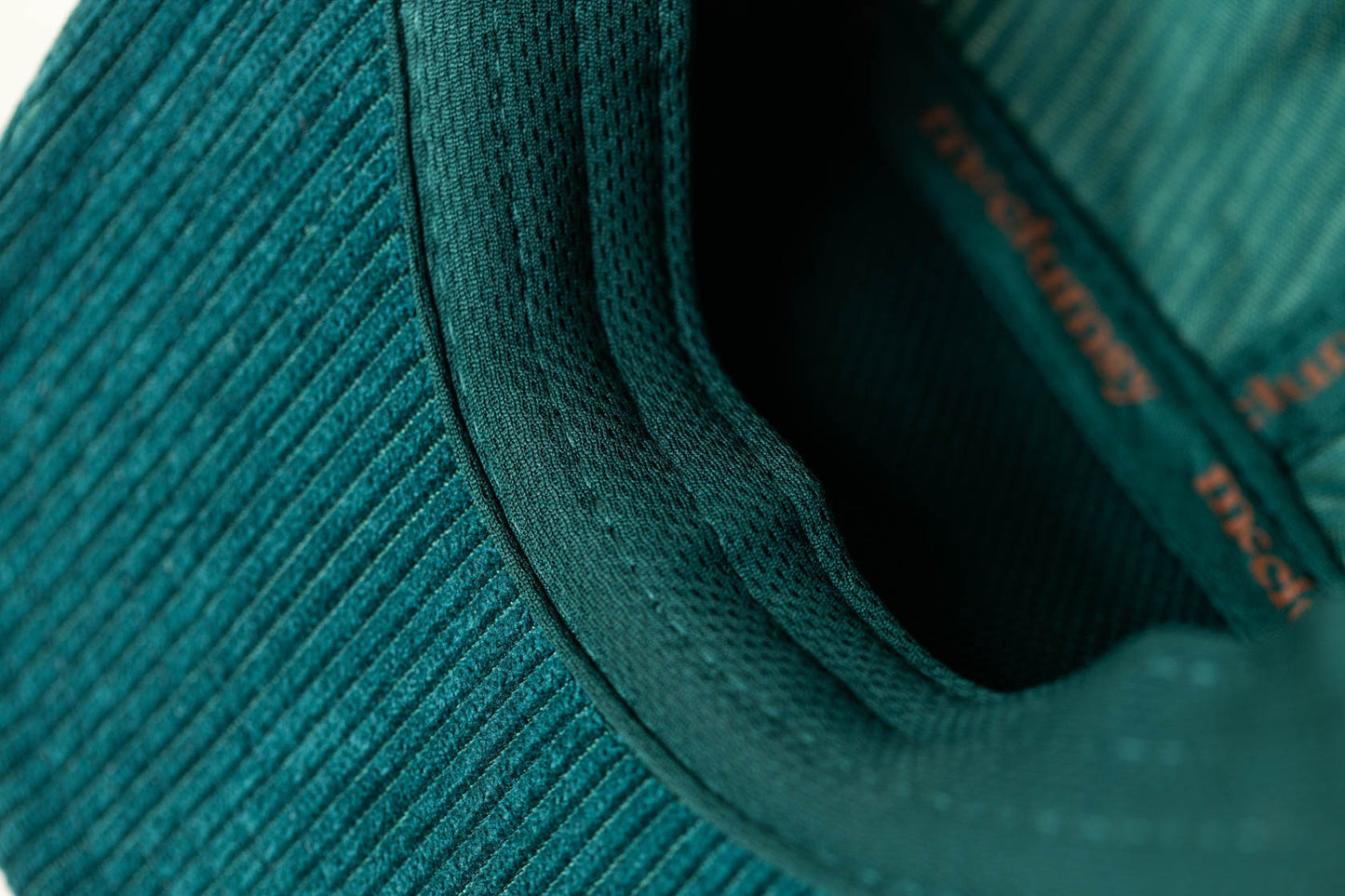 Close up view of the sweatband of the 5-Panel Rich Green McClumsy Corduroy Hat