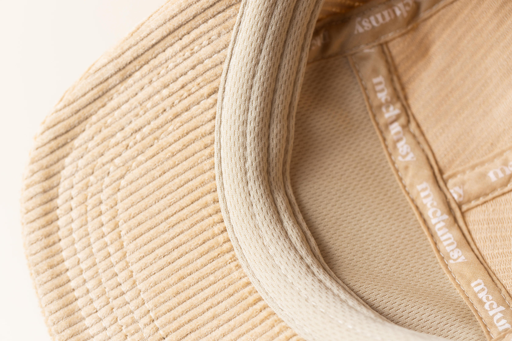 Inside view of Seam Tape and Sweatbanc in a McClumsy Thick Whale Light Tan 5 Panel Corduroy Hat