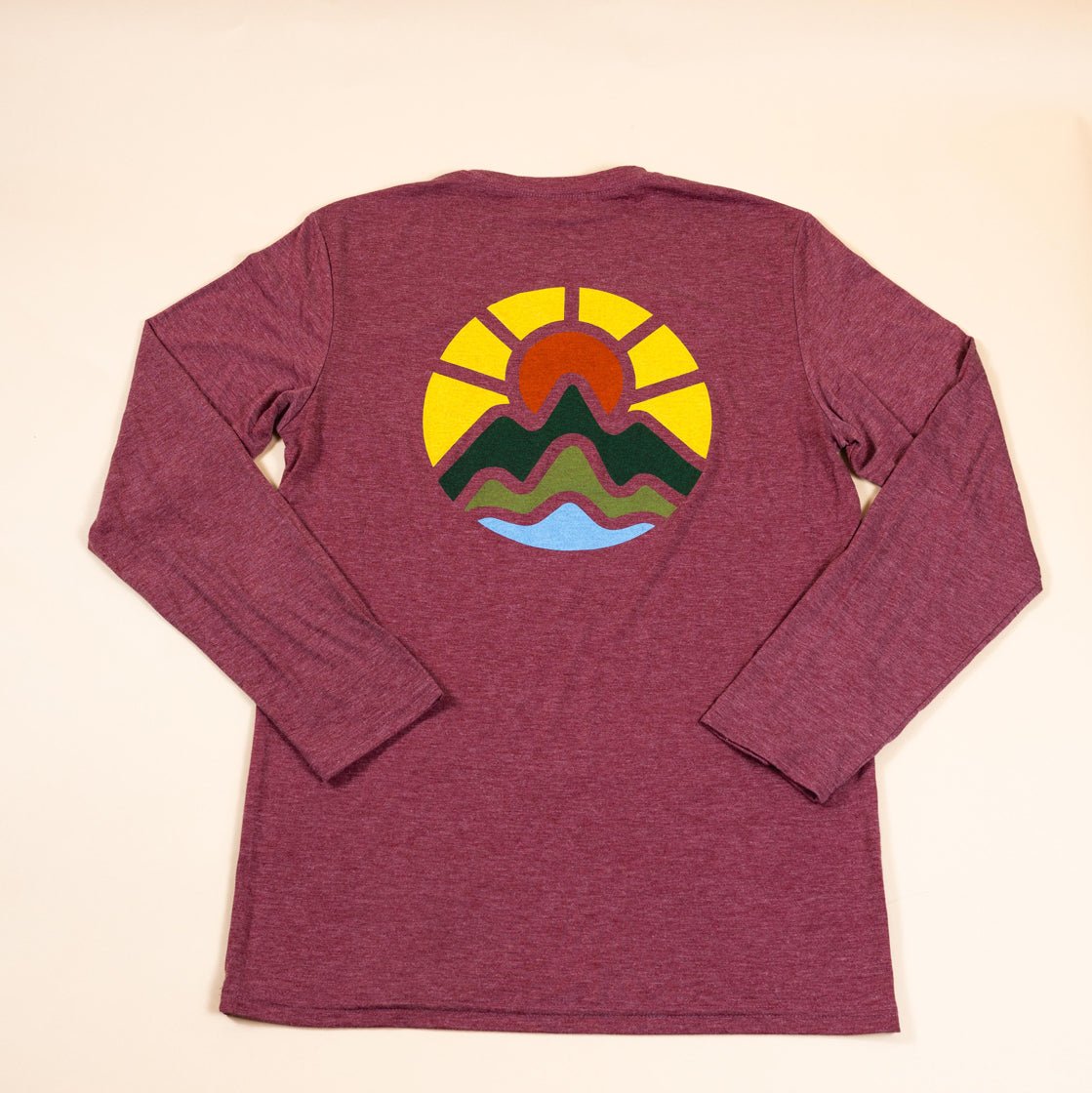 McClumsy Long Sleeve Maroon Heather Tri Blend T-shirt with a Full Color logo on the back.